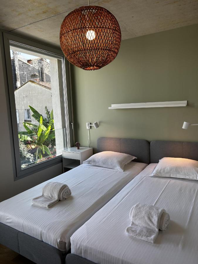 Magnifiques Appartements Dans บอร์โด ภายนอก รูปภาพ